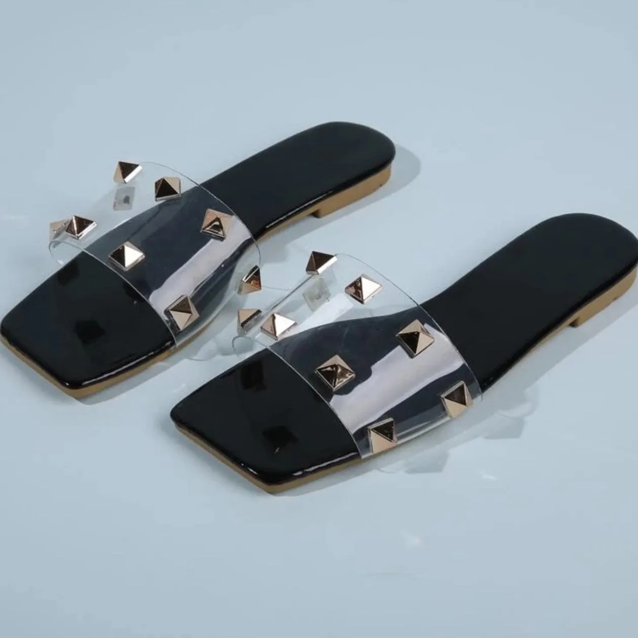 Get Edgy Spike-Studded Clear Band Slide Sandals