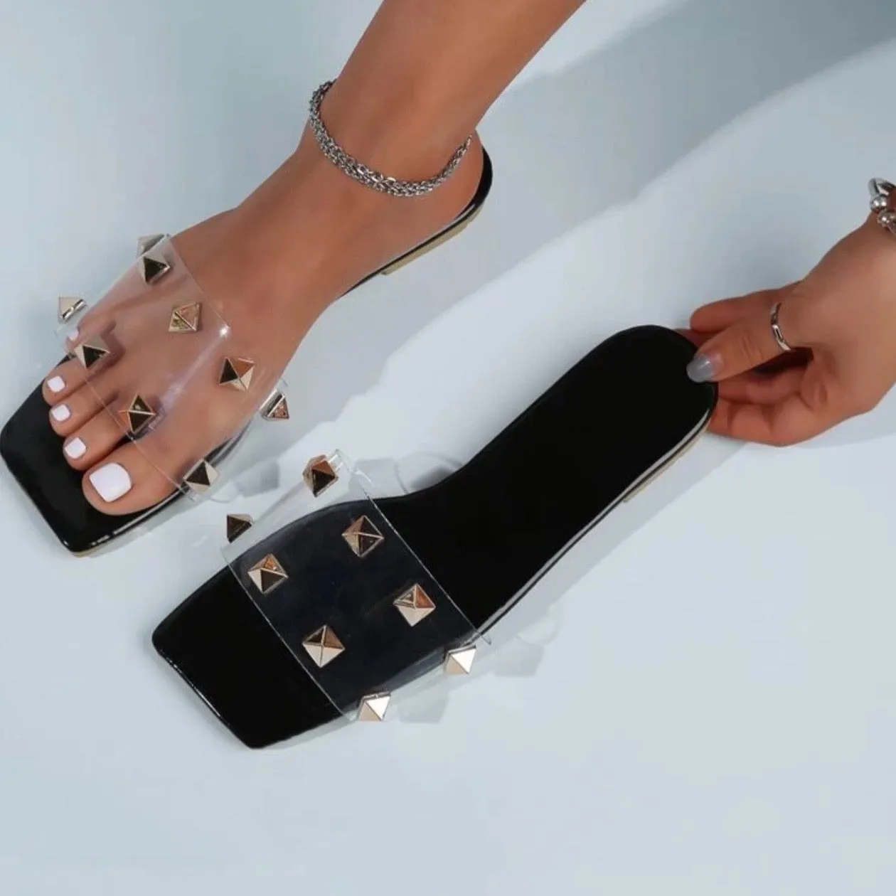 Get Edgy Spike-Studded Clear Band Slide Sandals