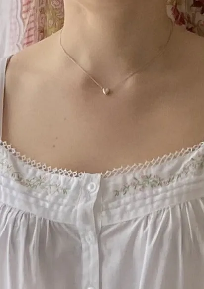 Jane with pink embroidery