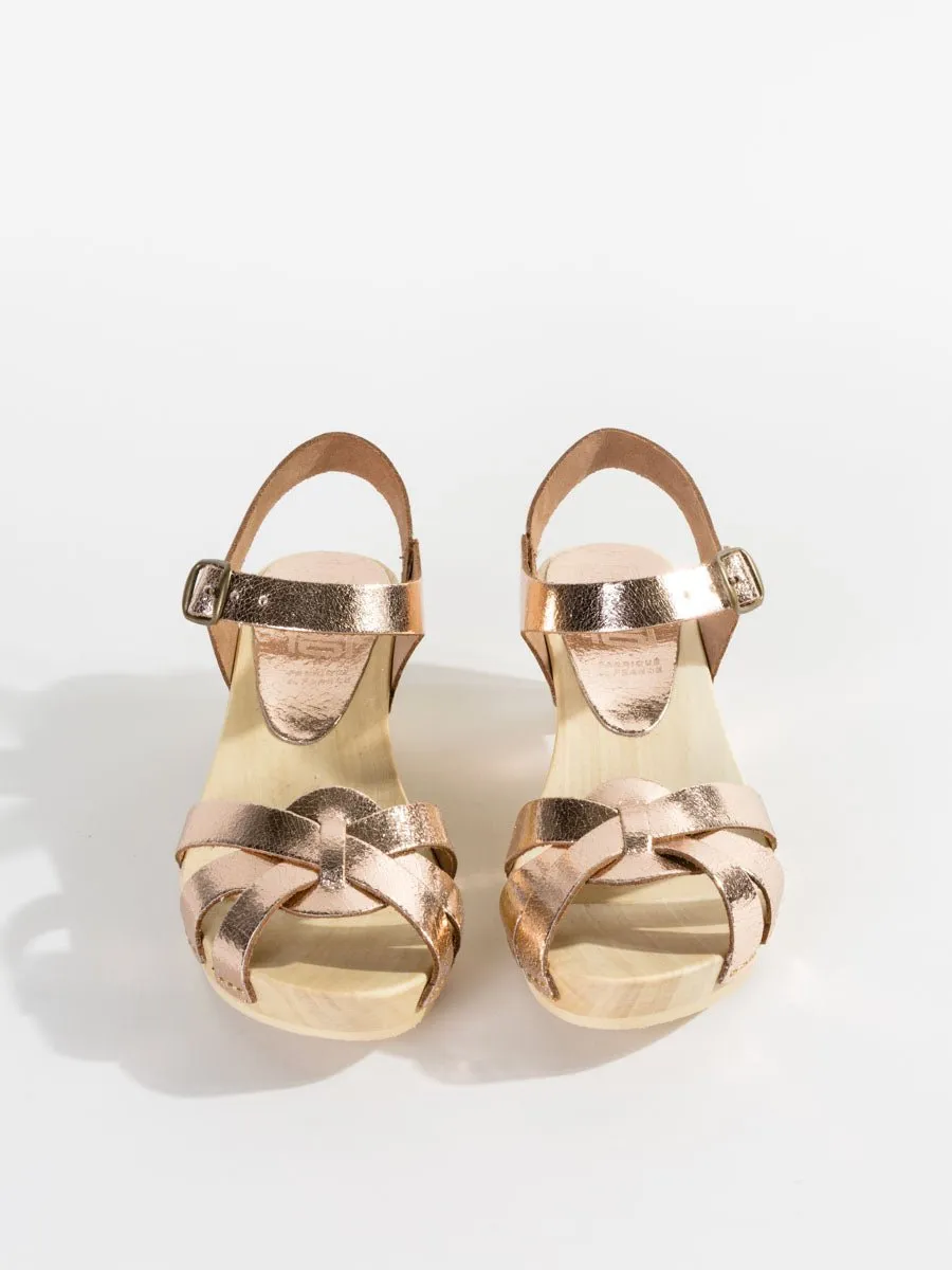 strappy old metal clog